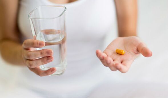 Taking tablets to prevent worms