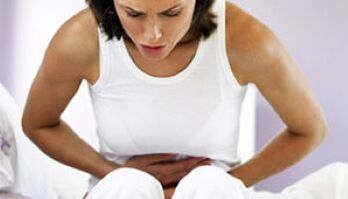 Woman with stomach pain caused by parasites